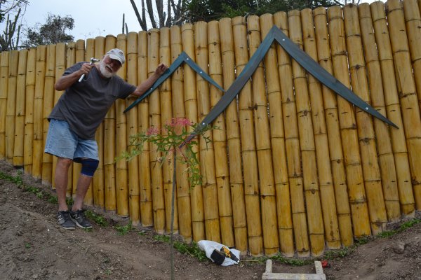 Attaching our logo to the bamboo